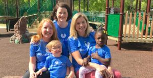 Group of people smiling on United Ability playground