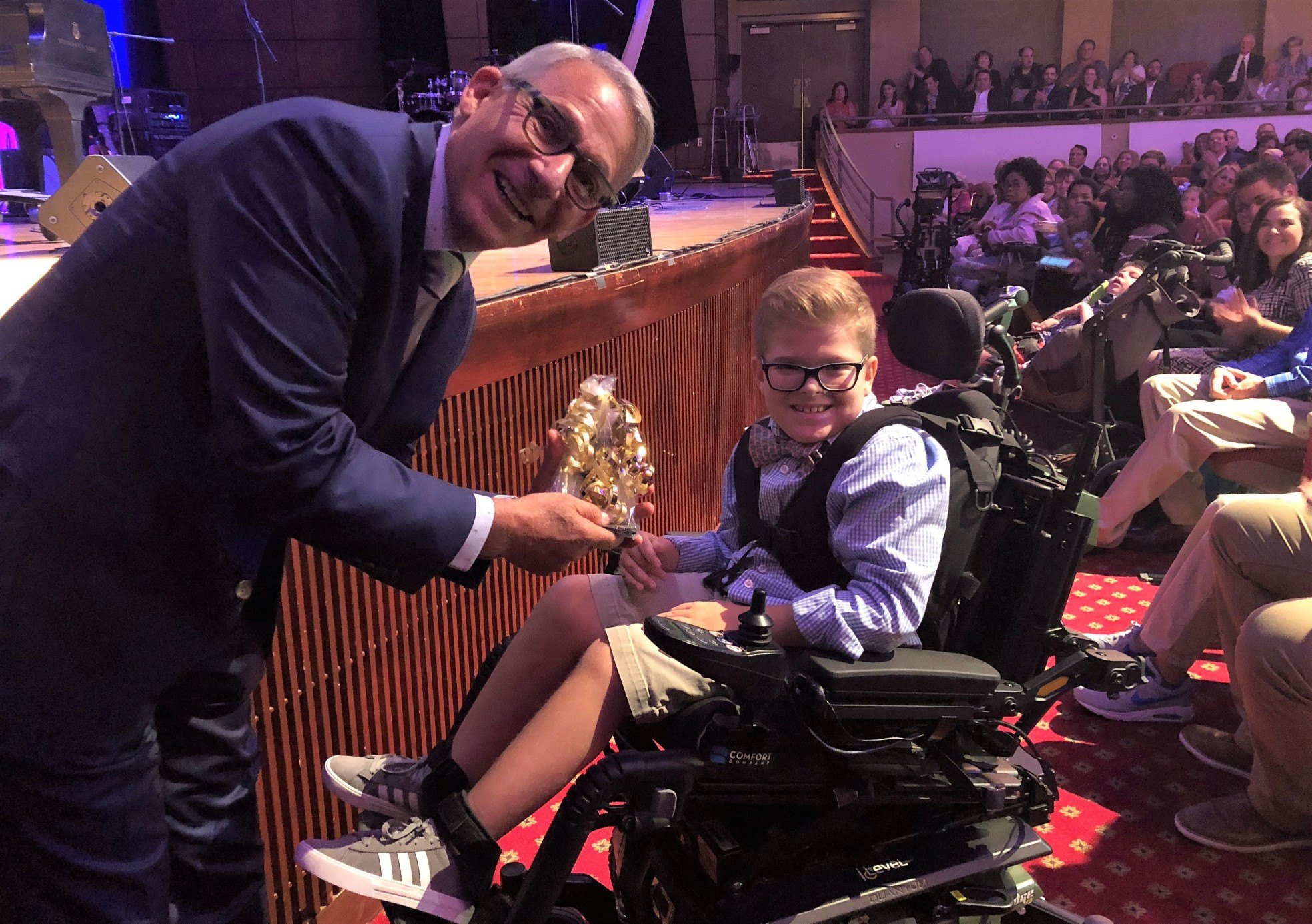 Man with disabled boy at 2018 Journey of Hope