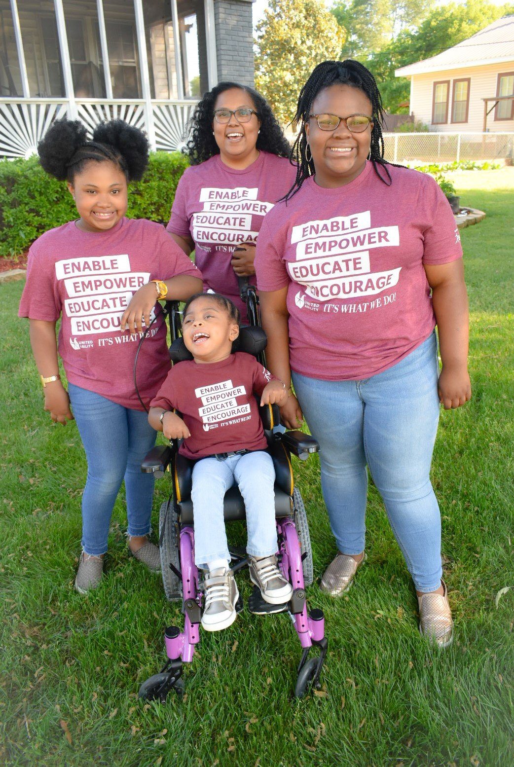 family of women wearing United Ability shirts